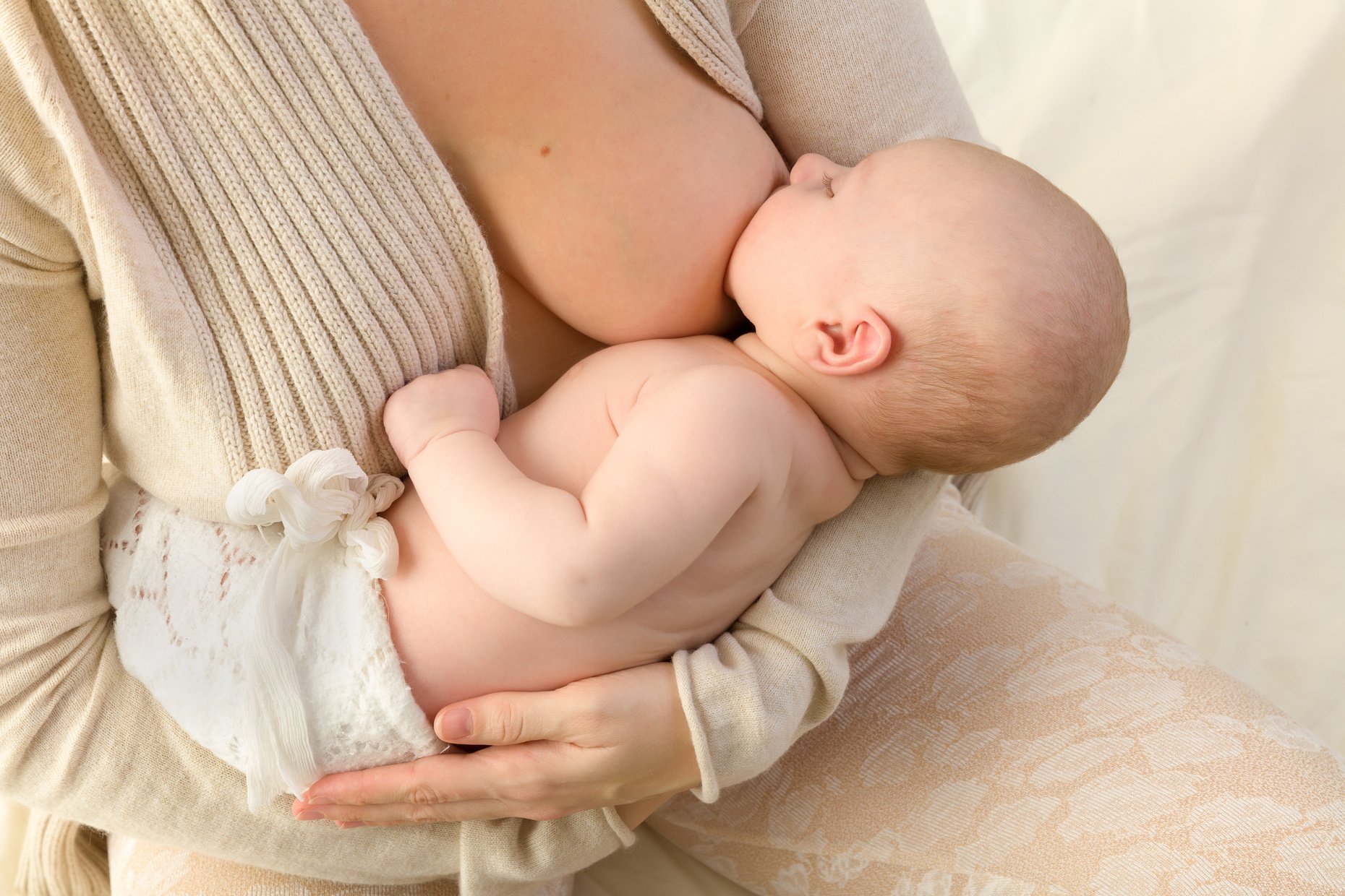 Mom in Bed Breastfeeding